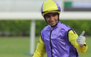 Joao Moreira returns to scale after winning aboard Time To Celebrate. Photos: Kenneth Chan