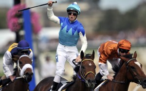 Zac Purton wins the 2014 Caulfield Cup with Admire Rakti. Photo: EPA/JULIAN SMITH