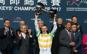 Zac Purton holds up the trophy after winning the International Jockeys’ Championship. Photos: Kenneth Chan