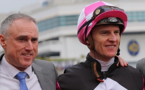 Paul O'Sullivan with Zac Purton after Win Beauty Win takes the Griffin Trophy. Photo: Kenneth Chan