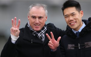 Paul O’Sullivan celebrates a treble with his assistant trainer. Photos: Kenneth Chan
