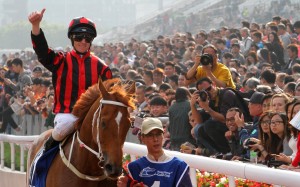 Zac Purton celebrates taking out the CITI Hong Kong Gold Cup on Time Warp. Photos: Kenneth Chan