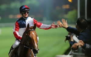 Zac Purton celebrates his win with Fast Most Furious. Photo: Kenneth Chan