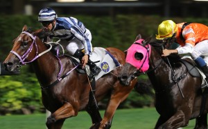 Joao Moreira pushes out Eighty Eighty to victory on Wednesday night. Photo: Kenneth Chan