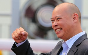 Chris So celebrates in the mounting yard after training a winner earlier this year. Photos: Kenneth Chan