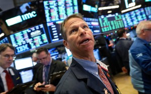 Traders work on the floor of the New York Stock Exchange on December 11. Photo: Reuters