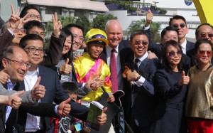 Ho Ho Khan’s connections are all smiles after his victory at Sha Tin on Sunday. Photos: Kenneth Chan
