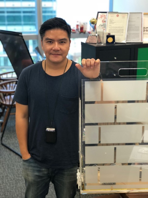 Film Players' Toby So and the multiple awards winning "smart film" which involves the application of 0.3-millimetre thick specially developed films on glass surface.