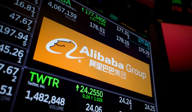 A monitor displays Alibaba Group signage on the floor of the New York Stock Exchange.