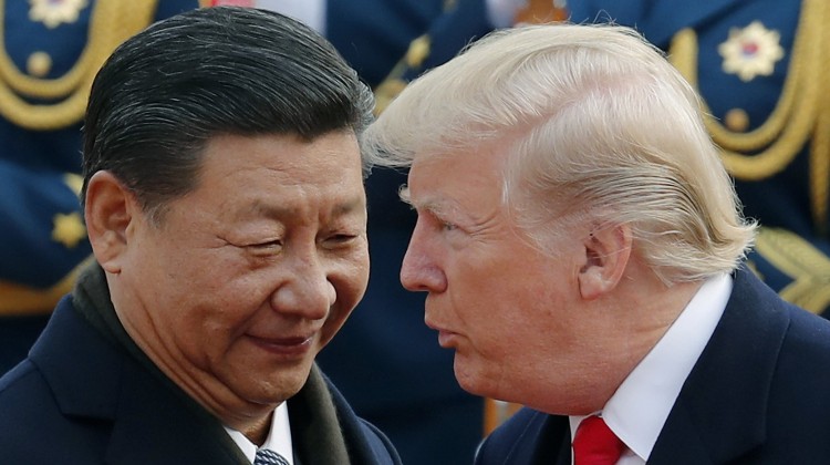 Donald Trump and Xi Jinping pictured in Beijing last year. Photo: AP