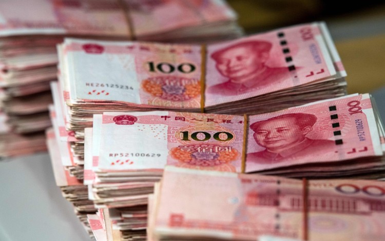 China maintains strict controls over capital flows, giving it leeway to keep interest rates low without risking capital flight. Photo: AFP