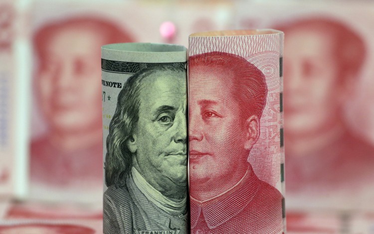 Despite Beijing's constant complaints about the dollar hegemony over the past decade, the greenback is still the default choice for China's trade settlement. Photo: Reuters