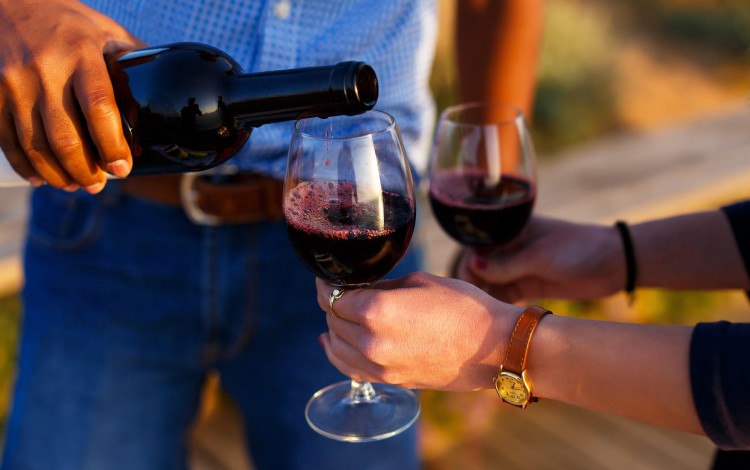 Red wine's purported health benefits include lowering bad cholesterol, preventing clots and reduce the growth of precancerous cells in premenopausal women. Picture: Alamy