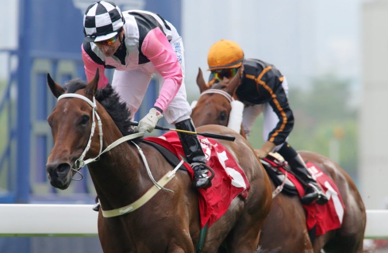 Beauty Flame held off a late charge from Able Friend to claim the Jockey Club Mile. Photo: Kenneth Chan