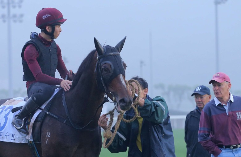 Rider Thomas Yeung gets instructions from trainer John Moore before taking Hong Kong Derby winner Werther for his final gallop ahead of Sunday’s Audemars Piguet QE II Cup. Photo: Kenneth Chan