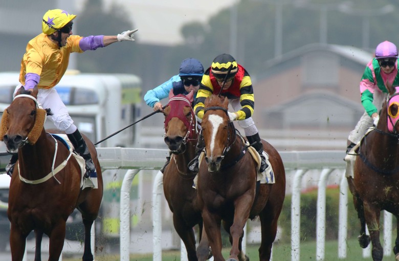 Neil Callan points at the crowd after taking out the Group Two Centenary Sprint at Sha Tin on Monday. Photos: Kenneth Chan