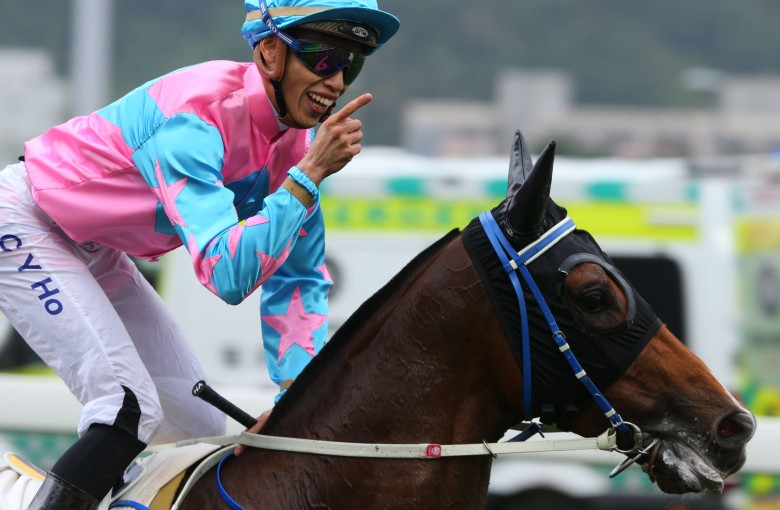 Vincent Ho is all smiles after guiding Apache Spirit to win at 100-1. Photos: Kenneth Chan