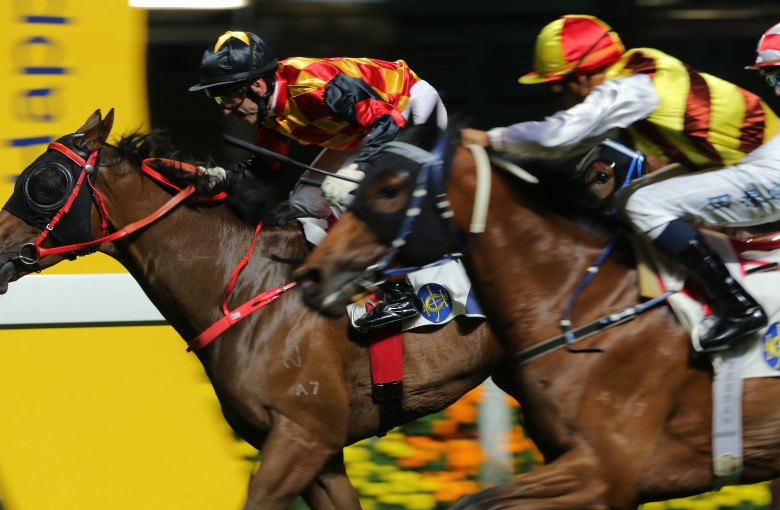 Olivier Doleuze drives Bond Elegance to victory at Happy Valley on Wednesday night. Photo: Kenneth Chan