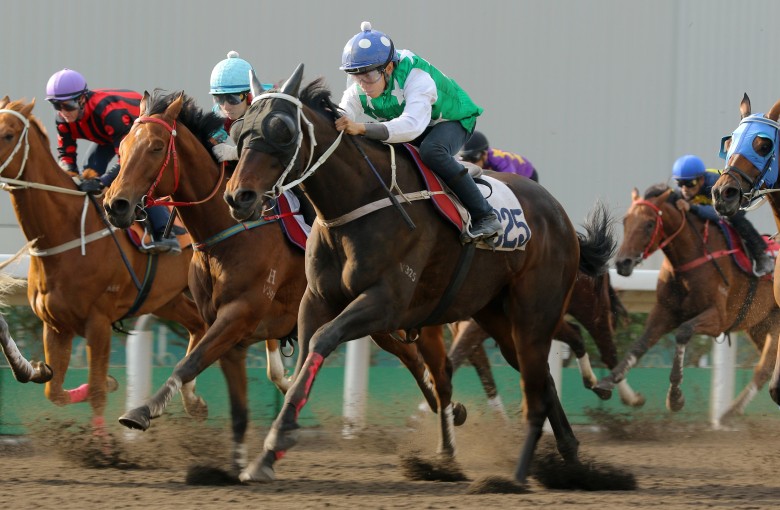 Pakistan Star (green and white silks) wins a trial at Sha Tin on Friday morning, beating home Time Warp (red and black). Photos: Kenneth Chan