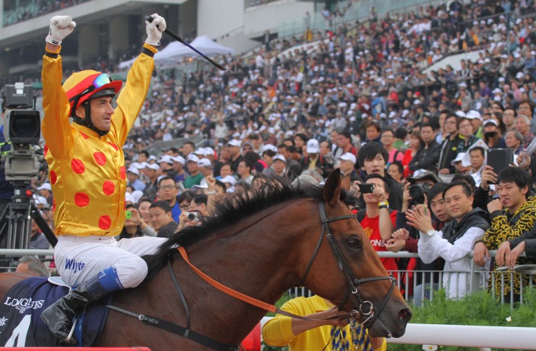 Douglas Whyte celebrates after winning the 2013 Hong Kong Cup with Akeed Mofeed. Photo: Kenneth Chan