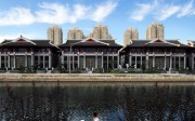 Expensive lakeside villas stand in front of public housing in the Chaoyang District of Beijing. Builders have been warned they won’t be granted pre-sale permits if they separate affordable from luxury housing in the same development. Photo: AFP