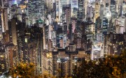 Residential and commercial buildings lit up at night in Hong Kong. Photo: Bloomberg