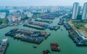 Fishing boats shelter in the harbour in Haikou, Hainan province, on Thursday in preparation for the arrival Typhoon Barijat and Super Typhoon Mangkhut. Photo: ImagineChina