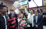 Lawmaker Vincent Cheng Wing-shun (left) and Alice Mak Mei-kuen (second left) celebrate Chan Hoi-yan’s (centre) victory. Photo: Sam Tsang