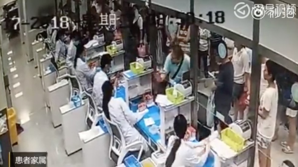 Chinese professor kicks, punches hospital staff over pregnant wife’s ...
