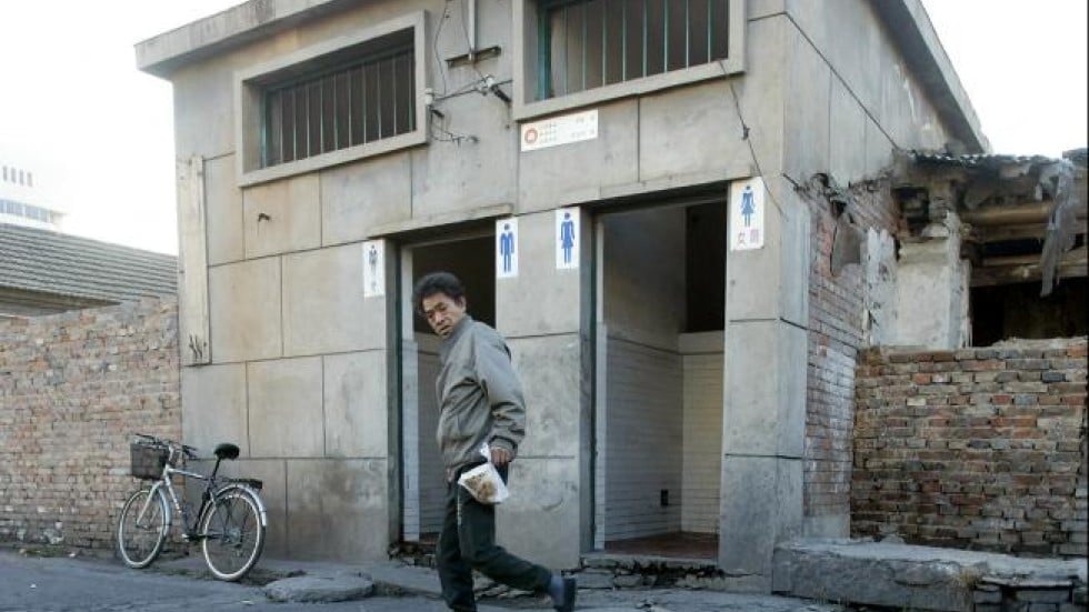 China to restrict fly numbers in its public toilets South China