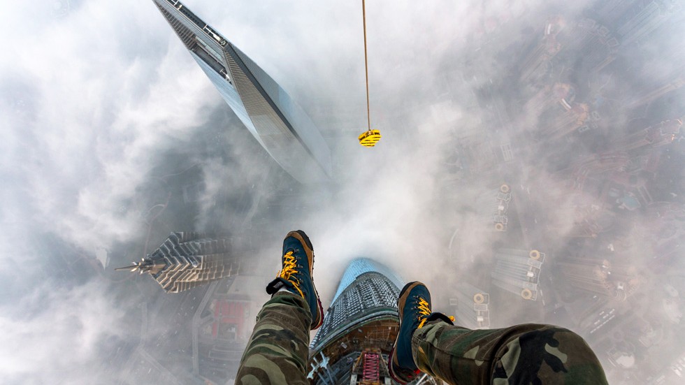 A perfect stunt Two Russian daredevils climb world’s second tallest
