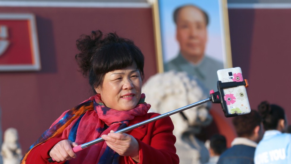 Image result for Chinese woman taking selfie picture at museum