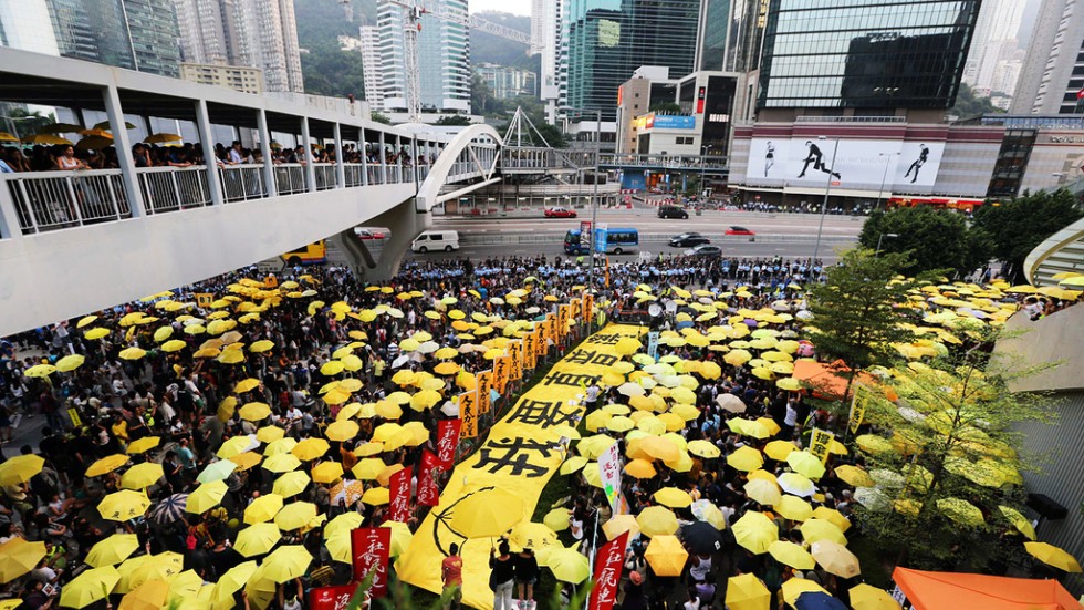 Yellow ribbons, umbrellas return as Hong Kong marks first anniversary