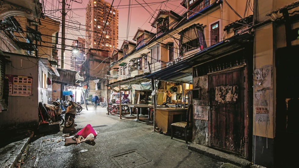 As development destroys old Shanghai, residents win payouts but lose