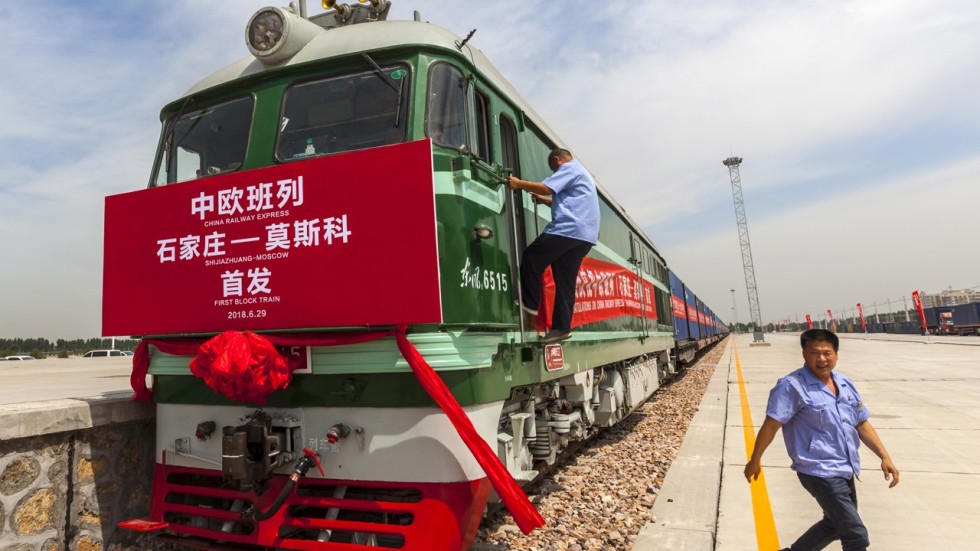 Railway workers prepare the first train for departure from Shijiazhuang, China to Moscow in Shijiazhuang, Hebei province. The launch of the China Railway Express China-Europe line is part of the Belt and Road Initiative. Photo: EPA