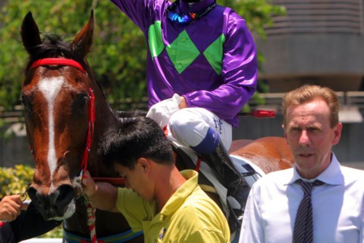 Fay Fay and trainer John Size (right). Photo: Kenneth Chan