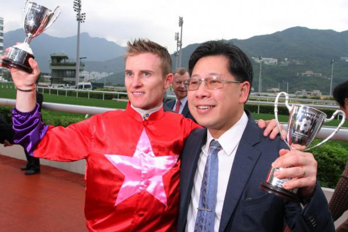 Zac Purton and Dennis Yip enjoy the moment after Why Not's win. Photo: Kenneth Chan