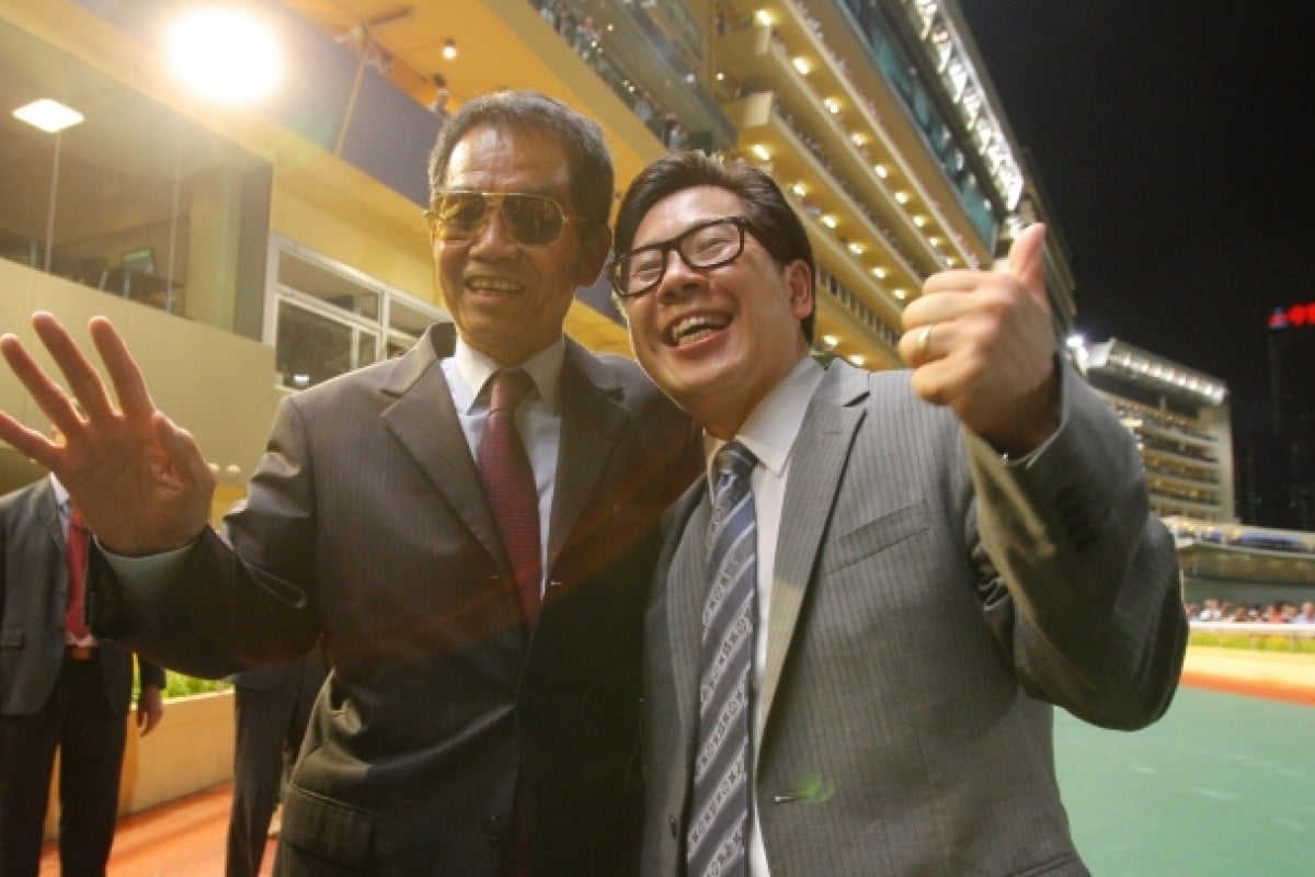 Dennis Yip (right) celebrates his thrilling title victory with his mentor, Brian Kan. Photos: Kenneth Chan