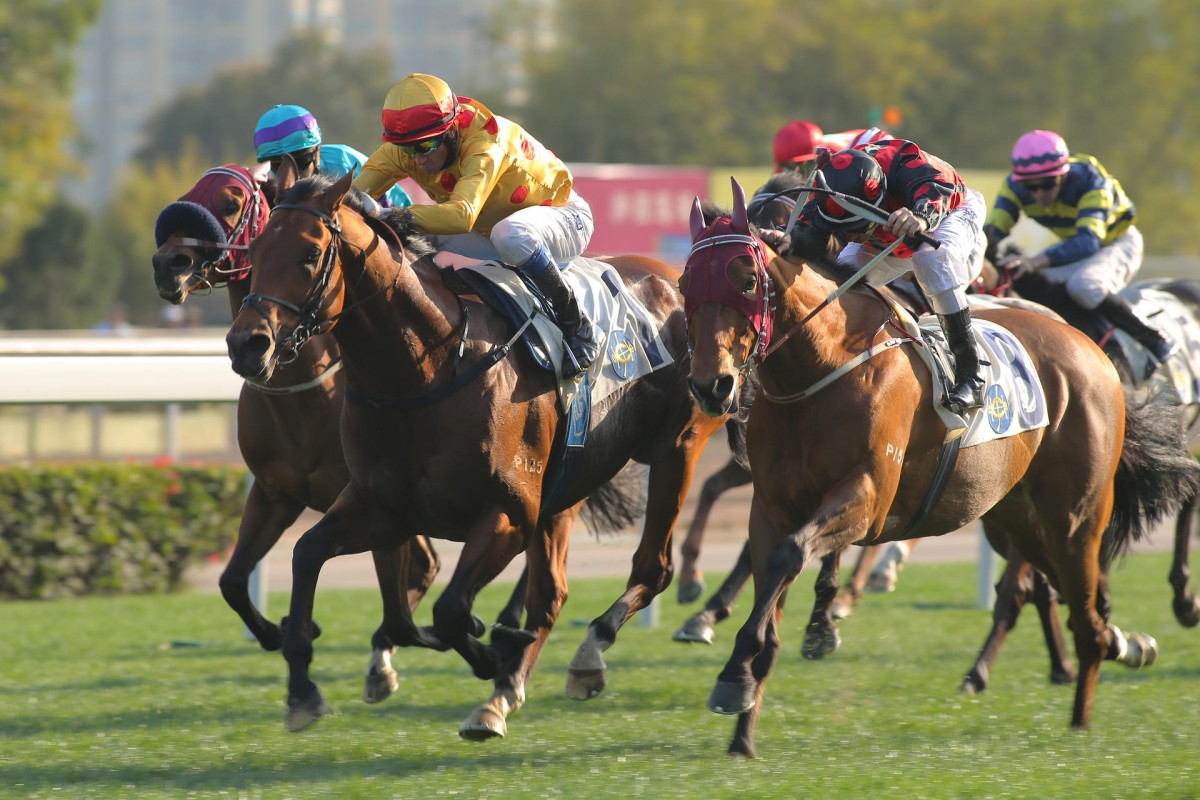 Akeed Mofeed and Douglas Whyte hold off the challenge of Ashkiyr (outside) to win the Centenary Vase. Photo: Kenneth Chan