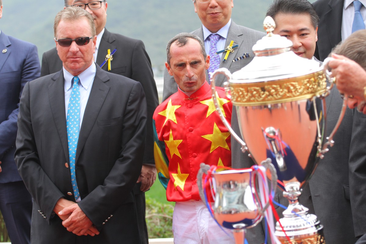 Gerald Mosse looks impressed at the Association of Hong Kong Racing Journalists Challenge Cup trophy after riding his first winner for Tony Millard since January 2008.