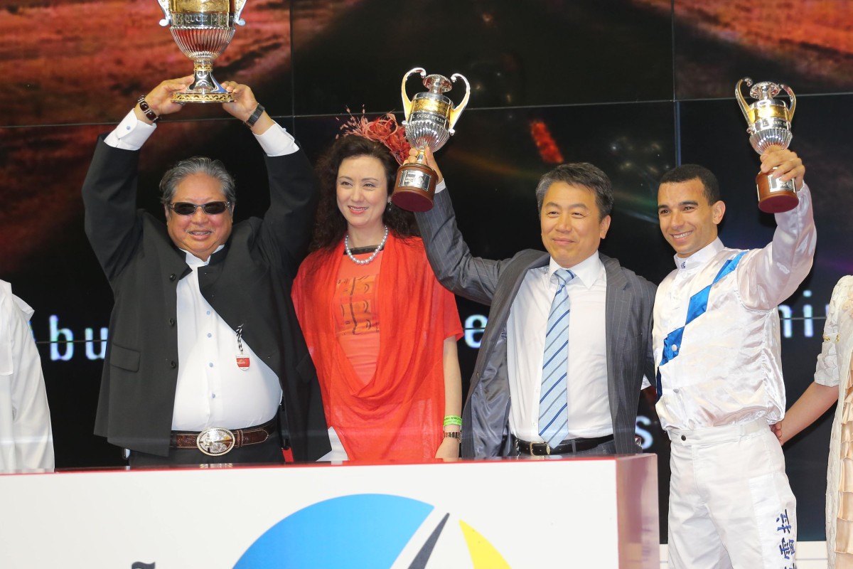 The connections of Amber Sky celebrate after his Al Quoz Sprint success.