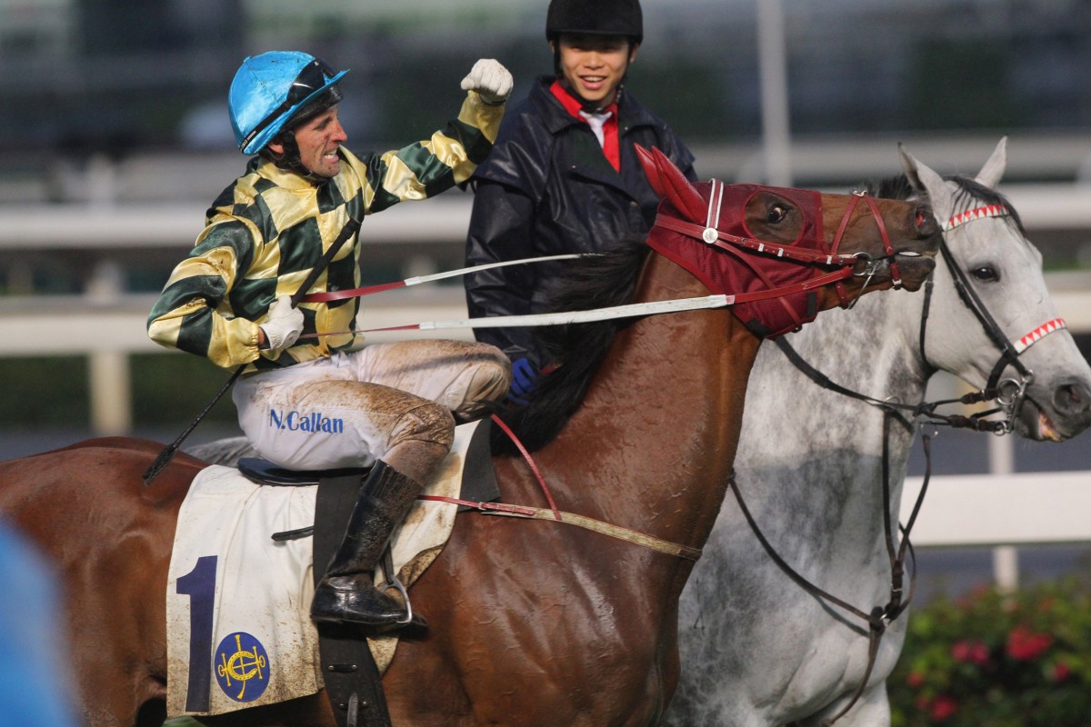 Neil Callan returns to the winner's circle on Rewarding Hero, two races after an improper riding incident with Eddy Lai Wai-ming - perhaps giving a demonstration. Photo: Kenneth Chan