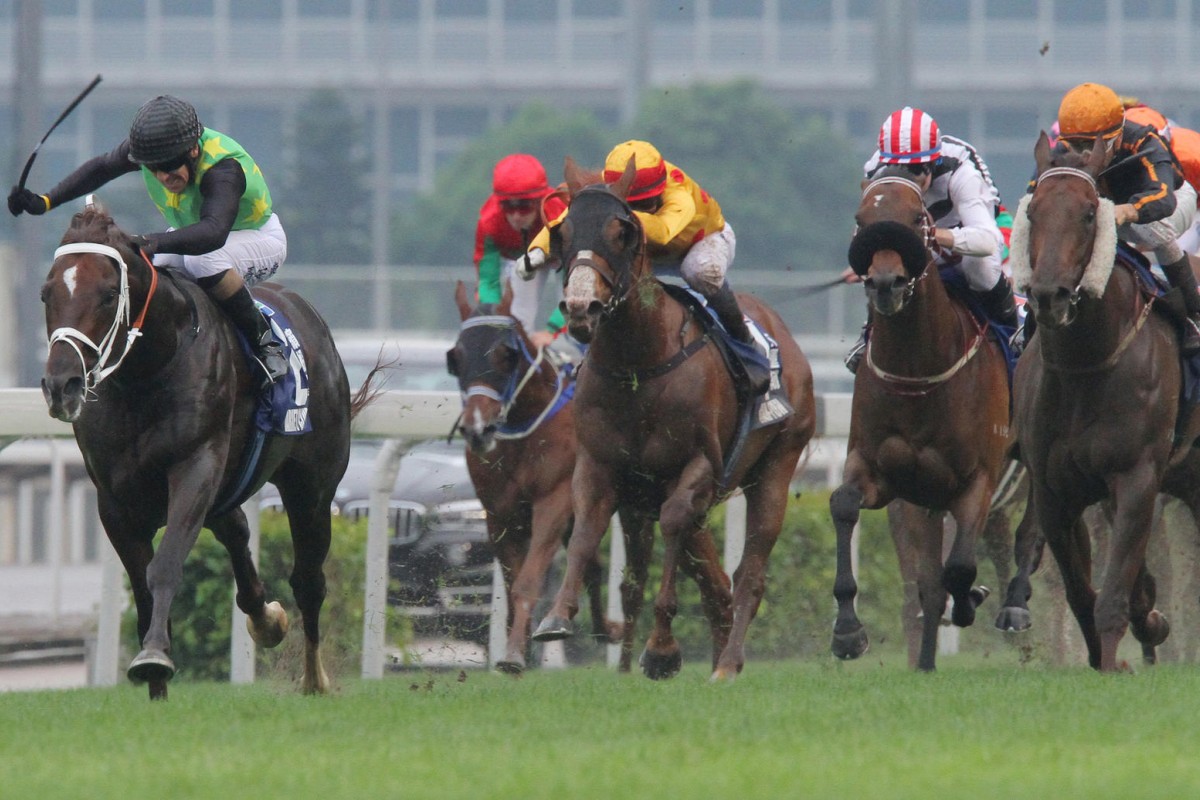 Variety Club, with Anton Marcus aboard, dashes well clear of the chasers - headed by Able Friend - with a scintillating victory in the Champions Mile at Sha Tin on Sunday. Photos: Kenneth Chan