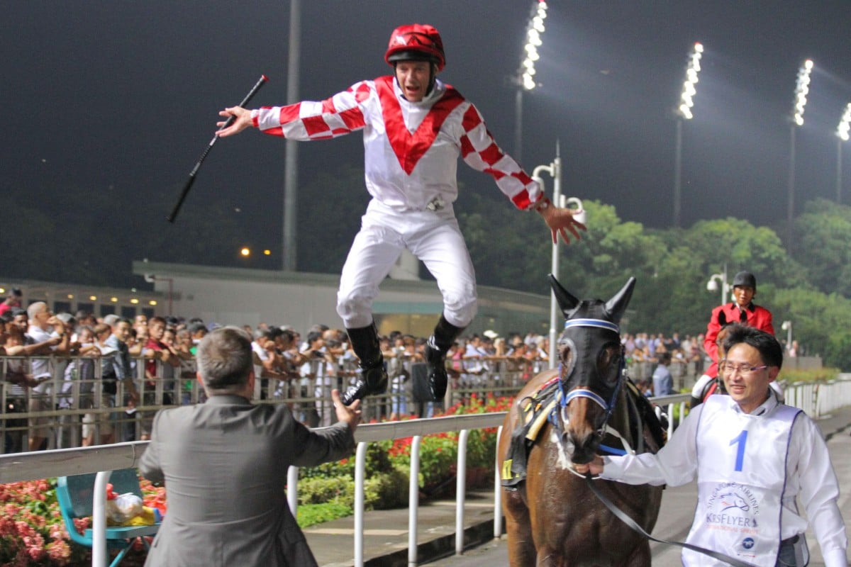 Brett Prebble's flying dismount gets a perfect 10 after Lucky Nine ran away with the KrisFlyer Sprint in Singapore. Photos: Kenneth Chan, AP, Reuters