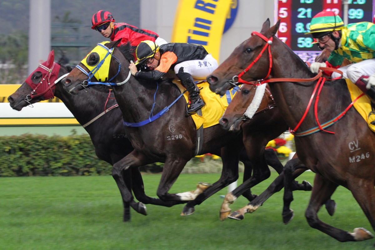 Arpinati (red and black), with Joao Moreira aboard, storms to victory in the Hong Kong Macau Trophy in a blanket finish at Sha Tin yesterday. Photos: Kenneth Chan
