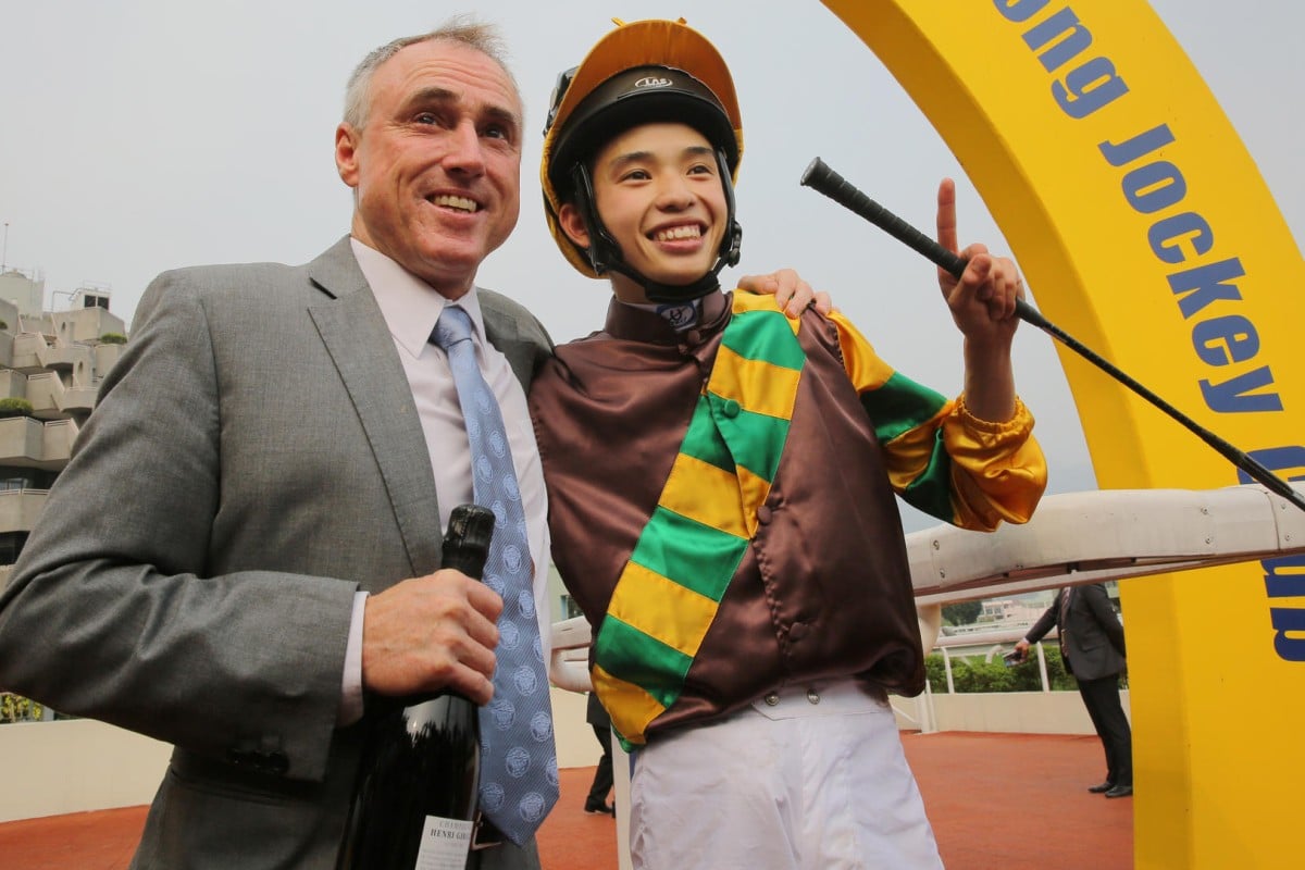 Paul O'Sullivan and Jack Wong Ho-nam celebrate after their victory with  Dane Patrol. Photos: Kenneth Chan