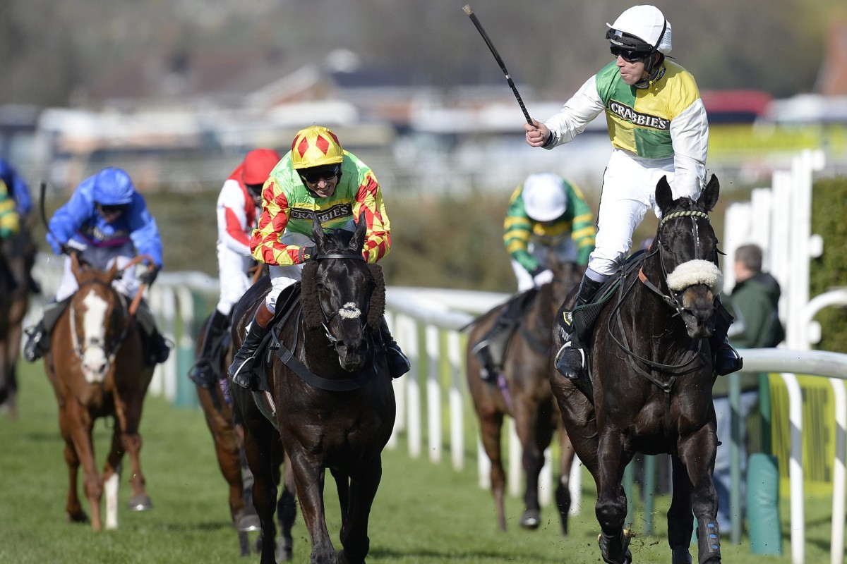 Leighton Aspell riding Many Clouds leads the field to win the Grand National held at Aintree. Photo: EPA