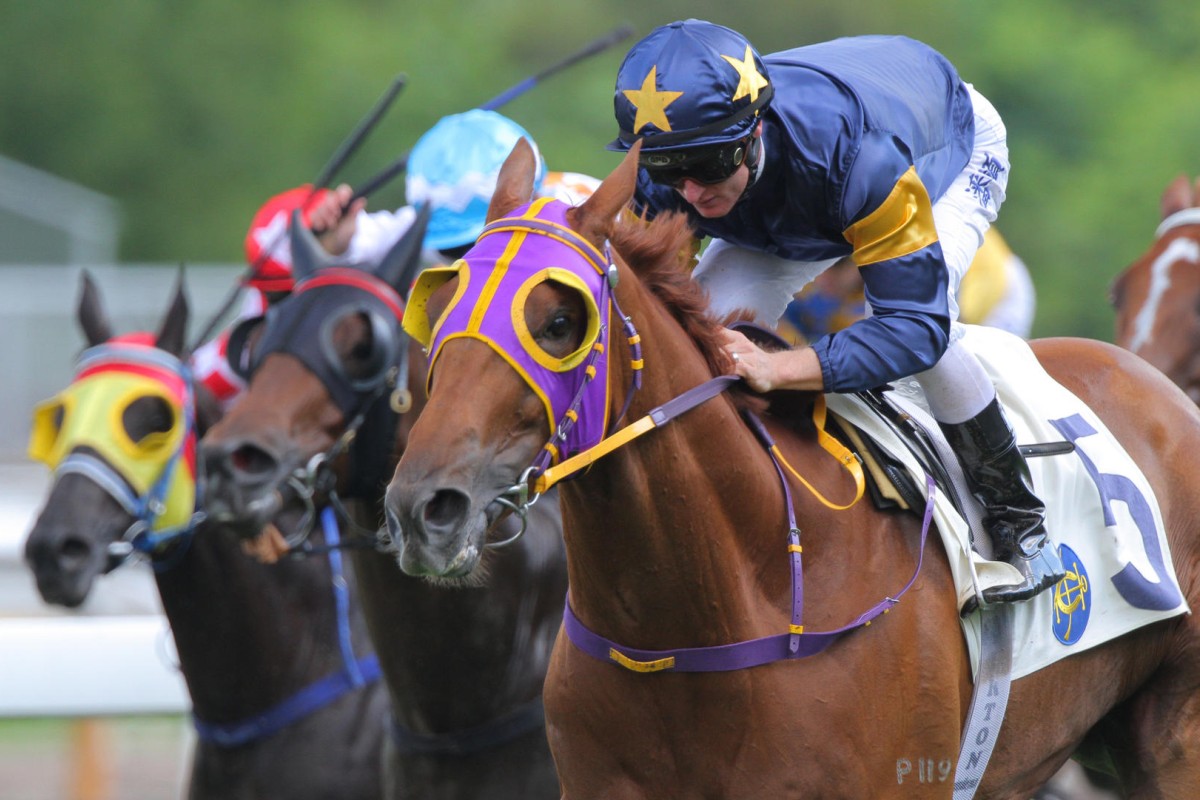 Zac Purton guides Winnam to the horse's second victory in Hong Kong. Photos: Kenneth Chan