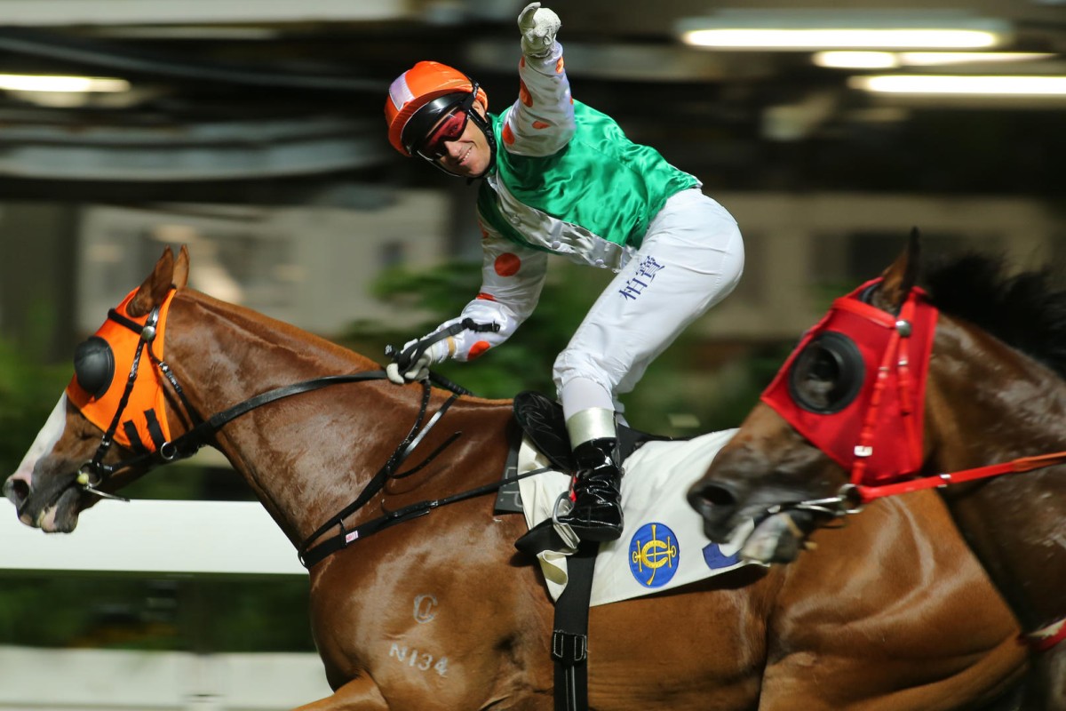 Brett Prebble salutes as he passes the post aboard Call Me Achiever, the one-time non-winner victorious again. Photos: Kenneth Chan