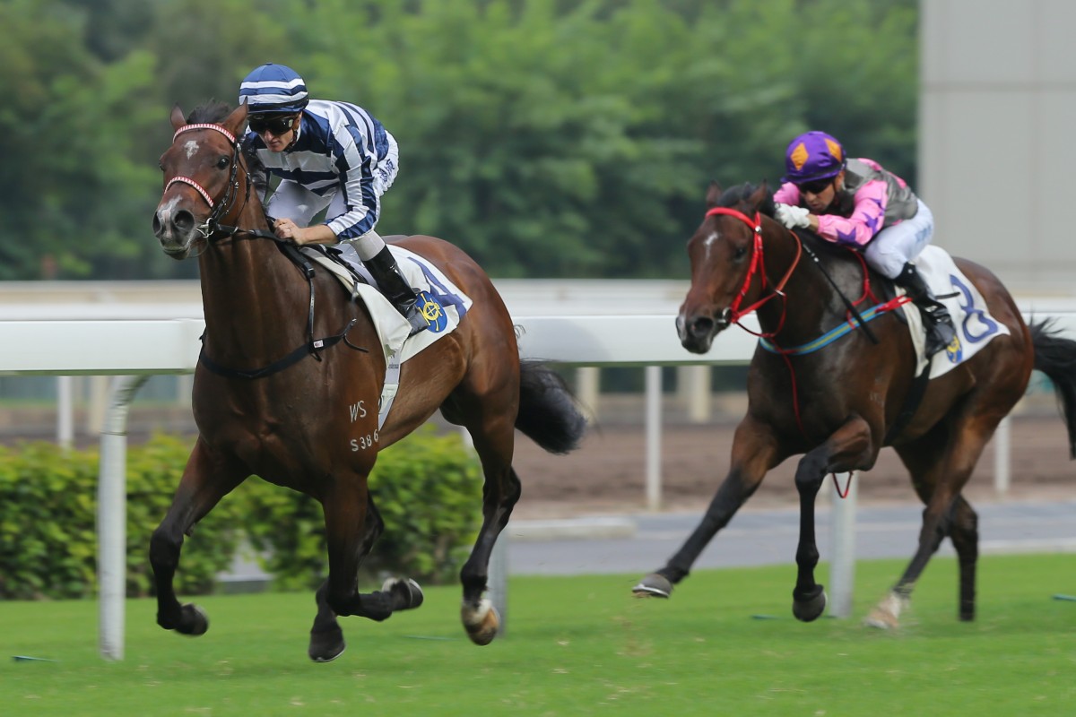 Packing Pins (Zac Purton) races away from Amazing Kids (Joao Moreira) to score a resounding success and set himself up for a Hong Kong Mile tilt. Photo: Kenneth Chan